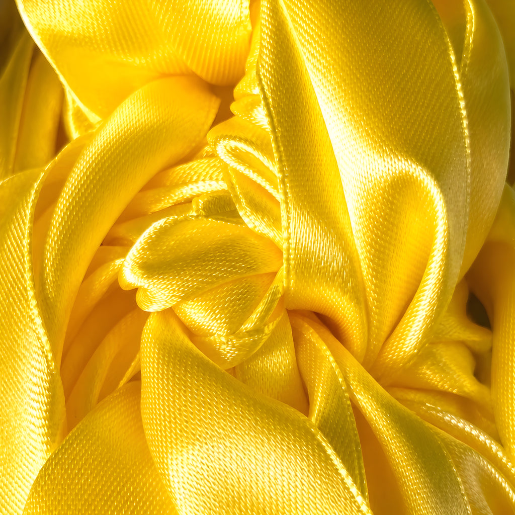Close-up of yellow SATIN CROCHET ribbon