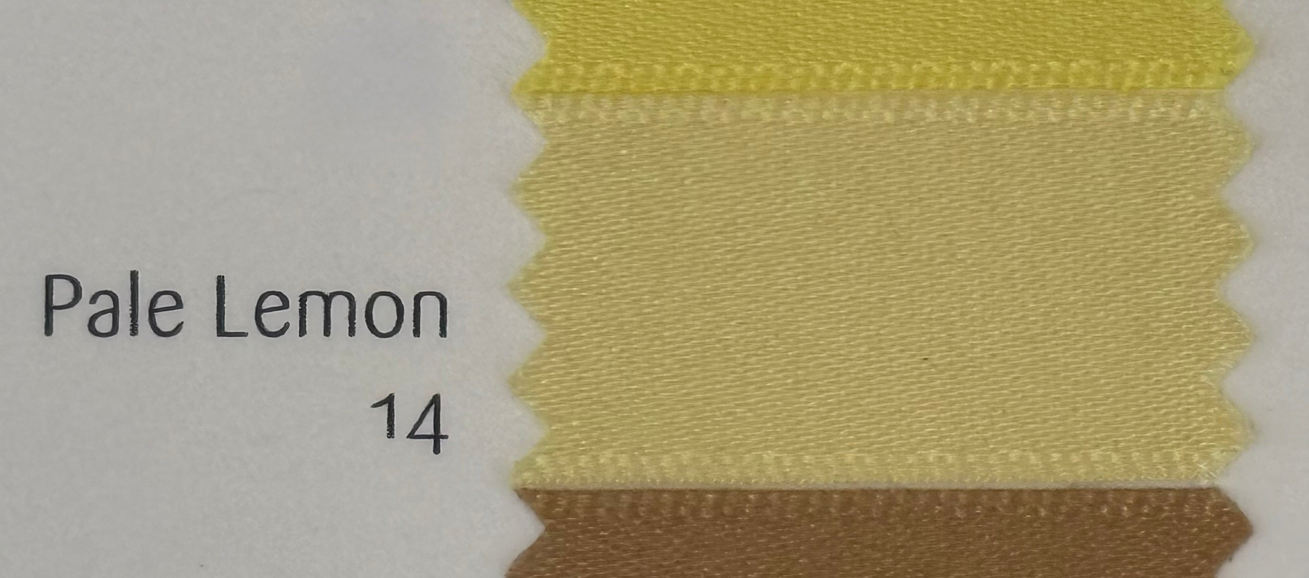 Textured fabric swatch labeled 'Pale Lemon 140' on a white background