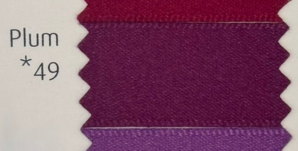 Textile swatch with plum color code 49 on a white background
