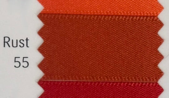 Textured fabric swatch labeled 'Rust 55' on a white background
