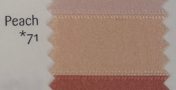 Peach-colored fabric swatch with a label indicating the color code 71.