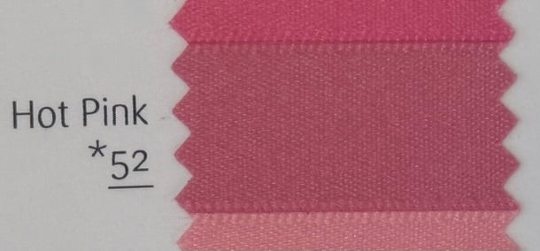 Hot pink fabric swatch with a label indicating the color number 52 on a white background