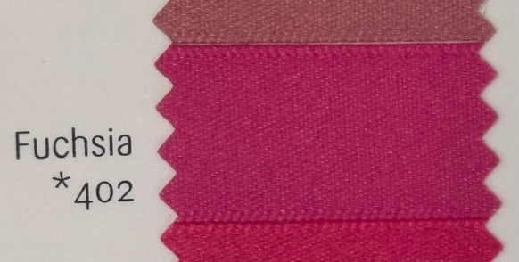 Fuchsia fabric swatch with a label indicating the color name and number 402 on a white background