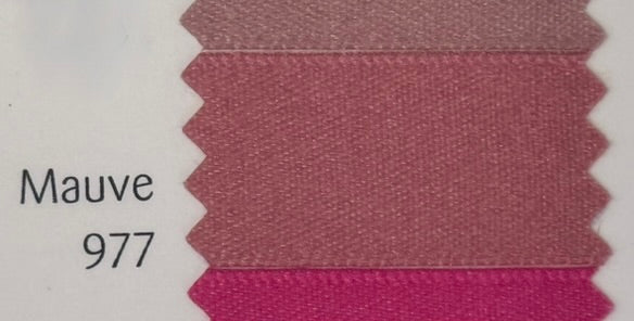 Mauve fabric swatch with color code 977 on a white background