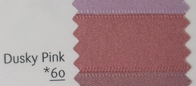 Pink fabric swatch labeled 'dusky pink 60' on a white background