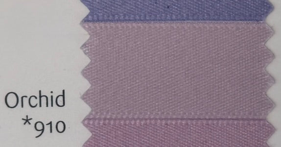 Fabric swatch with 'Orchid' color code 910 on a white background