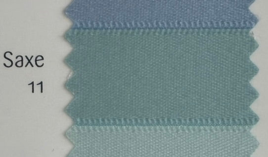Textured fabric swatch labeled 'Saxe 11' on a white background