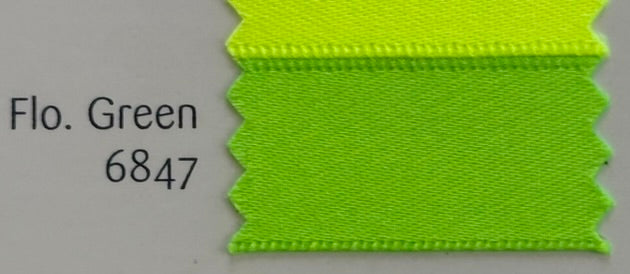 Neon green fabric swatch with 'Flo. Green 6847' label on a gray background